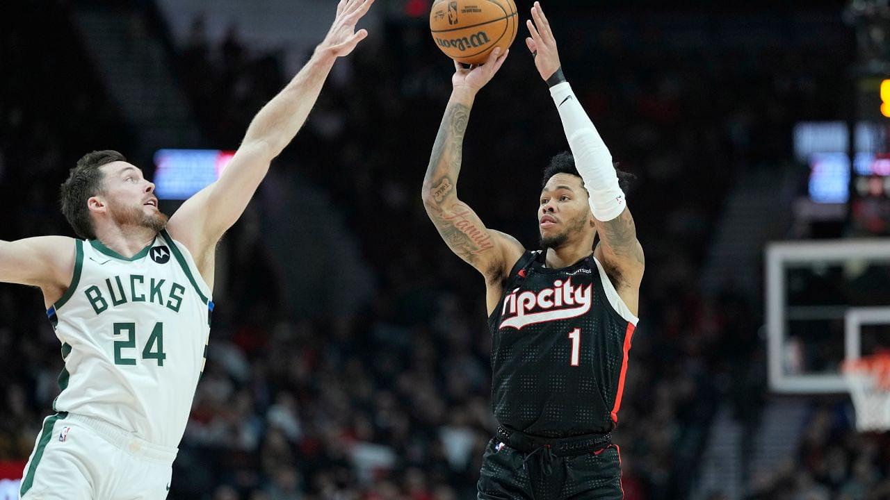 Portland Trail Blazers shooting guard Anfernee Simons (1) shoots the ball over Milwaukee Bucks shooting guard Pat Connaughton (24) during the first half at Moda Center.