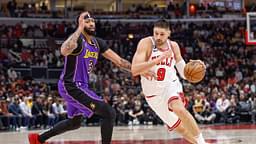 Chicago Bulls center Nikola Vucevic (9) drives to the basket against Los Angeles Lakers forward Anthony Davis (3) during the first half at United Center.