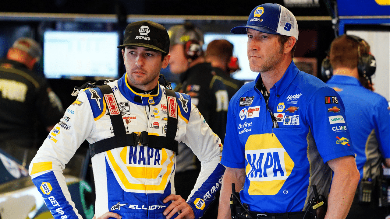 Feb 17, 2023; Daytona Beach, Florida, USA; NASCAR Cup Series driver Chase Elliott (9) talks with his crew chief Alan Gustafson as they work to ready his car before practice for the Daytona 500 at Daytona International Speedway. Mandatory Credit: John David Mercer-Imagn Images