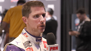 Denny Hamlin talks with Performance Racing Network Wednesday, February 14, 2024 during Daytona 500 Media Day at Daytona International Speedway.