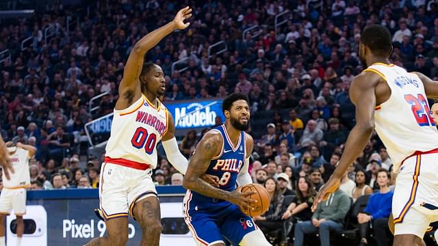 Philadelphia 76ers forward Paul George (8) drives past Golden State Warriors forward Jonathan Kuminga (00) during the first quarter at Chase Center.