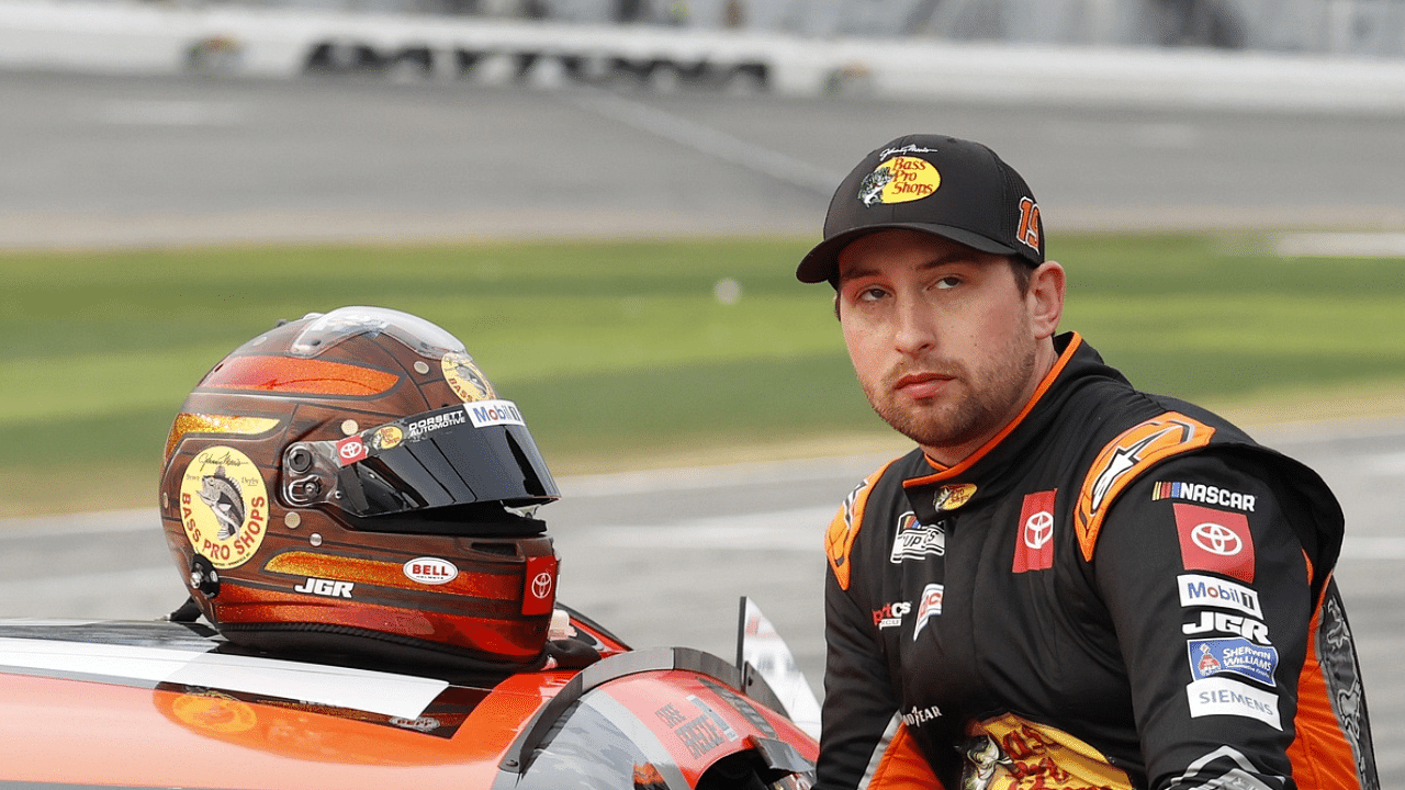 NASCAR Cup Series driver Chase Briscoe (19) prepares to get in the car after a rain delay for the Daytona 500 at Daytona International Speedway.