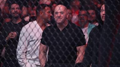 UFC CEO Dana White watches the fight between Cub Swanson (red gloves) and Billy Quarantillo (blue gloves) at Amalie Arena.