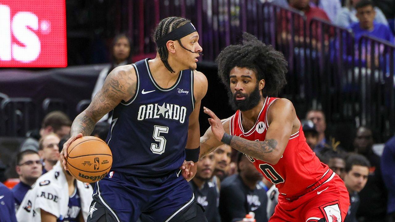 Orlando Magic forward Paolo Banchero (5) moves the ball around Chicago Bulls guard Coby White (0) during the second half at KIA Center.