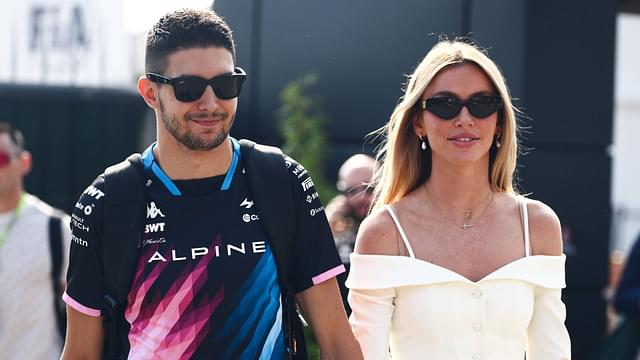 Esteban Ocon of Alpine and his girlfriend Flavy Barla arrive at the paddock ahead of the Italian Formula One Grand Prix at Autodromo Nazionale Monza