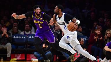 Dallas Mavericks guard Kyrie Irving (2) moves the ball against Los Angeles Lakers forward Anthony Davis (3) during the second half at Crypto.com Arena