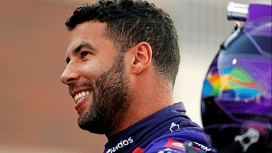 Feb 1, 2025; WInston-Salem, North Carolina, USA; NASCAR Cup Series driver Bubba Wallace (23) looks on during practice for the Clash at Bowman Gray at Bowman Gray Stadium. Mandatory Credit: Peter Casey-Imagn Images