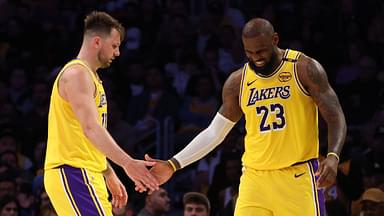 Los Angeles Lakers guard Luka Doncic (77) and forward LeBron James (23) celebrate after a play during the fourth quarter against the Minnesota Timberwolves at Crypto.com Arena