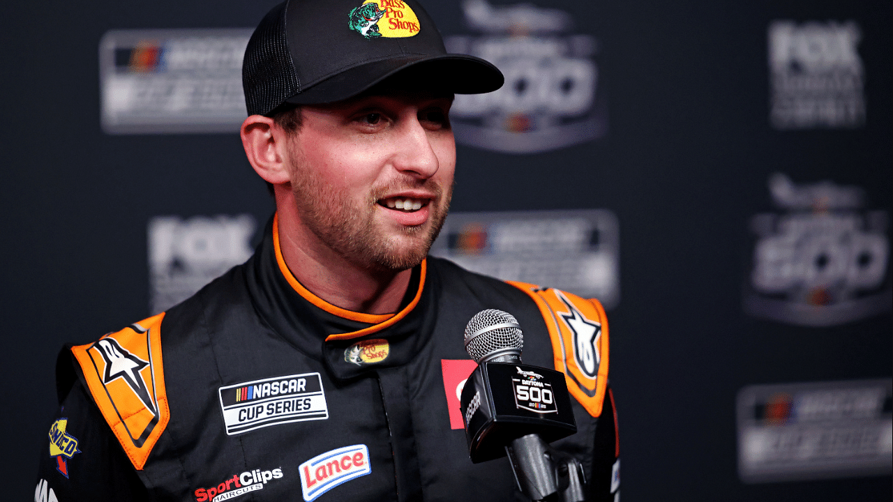 Feb 12, 2025; Daytona Beach, Florida, USA; NASCAR Cup Series driver Chase Briscoe (19) during Daytona 500 media day at Daytona International Speedway. Mandatory Credit: Peter Casey-Imagn Images