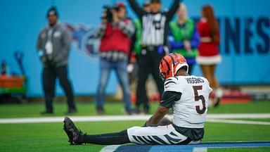 Cincinnati Bengals wide receiver Tee Higgins (5) takes a breath after catching a touchdown pass against the Tennessee Titans during the second quarter at Nissan Stadium in Nashville, Tenn.