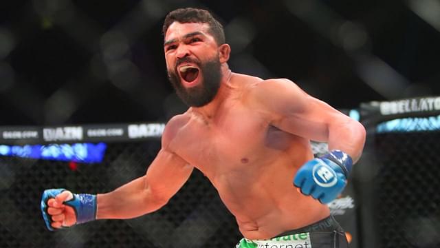 Patricio Freire (blue gloves) celebrates after defeating Michael Chandler (red gloves) during Bellator 221 at Allstate Arena.