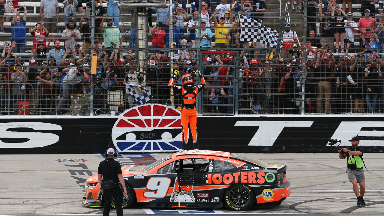 Apr 14, 2024; Fort Worth, Texas, USA; NASCAR Cup Series driver Chase Elliott (9) celebrates at the start finish line after winning the NASCAR Cup Series AutoTrader EchoPark 400 at Texas Motor Speedway. Mandatory Credit: Michael C. Johnson-Imagn Images