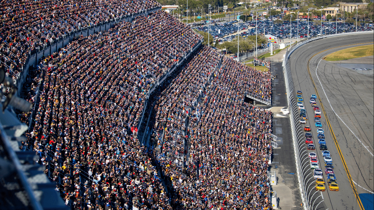 Feb 19, 2024; Daytona Beach, Florida, USA; NASCAR Cup Series driver Joey Logano (22) and Michael McDowell (34) lead the field to the green flag during the Daytona 500 at Daytona International Speedway. Mandatory Credit: Mark J. Rebilas-Imagn Images