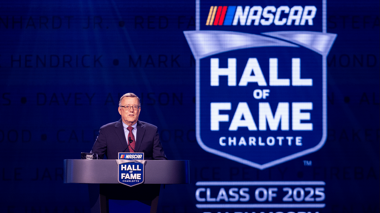 Feb 7, 2025; Charlotte, NC, USA; Ralph Moody III accepts the award for his father Former driver Ralph Moody as he is inducted into the 2025 NASCAR Hall Of Fame at Charlotte Convention Center Crown Ballroom. Mandatory Credit: Scott Kinser-Imagn Images