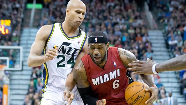 Miami Heat small forward LeBron James (6) dribbles the ball in front of Utah Jazz small forward Richard Jefferson (24) during the first half at EnergySolutions Arena.