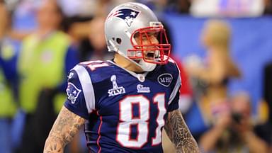 Feb 5, 2012; Indianapolis, IN, USA; New England Patriots tight end Aaron Hernandez celebrates as he scores a touchdown during Super Bowl XLVI against the New York Giants at Lucas Oil Stadium.