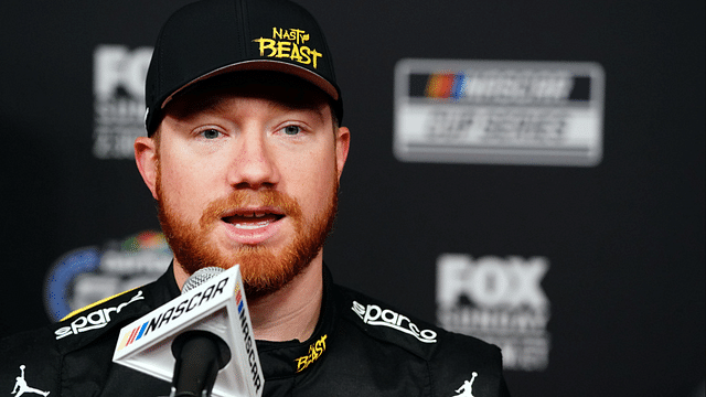 Feb 14, 2024; Daytona Beach, Florida, USA; NASCAR Cup Series driver Tyler Reddick (45) speaks with reporters during media day at Daytona International Speedway. Mandatory Credit: John David Mercer-Imagn Images