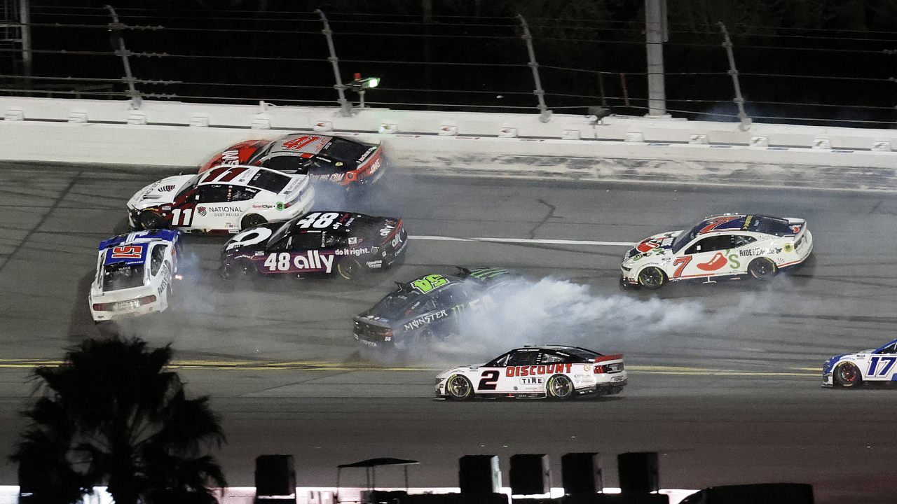 NASCAR Cup Series driver Denny Hamlin (11), driver Cody Ware (51) and driver Ty Gibbs (54) wreck during the Daytona 500 at Daytona International Speedway.