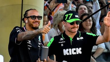 Lewis Hamilton of Mercedes and Valtteri Bottas of Kicj Sauber are seen during the drivers parade of Formula 1 Abu Dhabi Grand Prix at Yas Marina Circuit