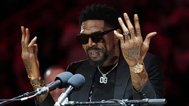 Udonis Haslem speaks after his jersey was lifted to the rafters during the retirement ceremony during halftime of the game between the Miami Heat and the Atlanta Hawks Kaseya Center.