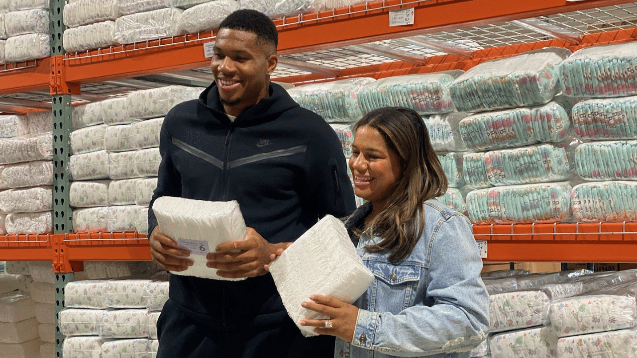 Bucks superstar Giannis Antetokounmpo and his longtime partner Mariah Riddlesprigger at the Milwaukee Diaper Mission on Sept. 11, 2023.