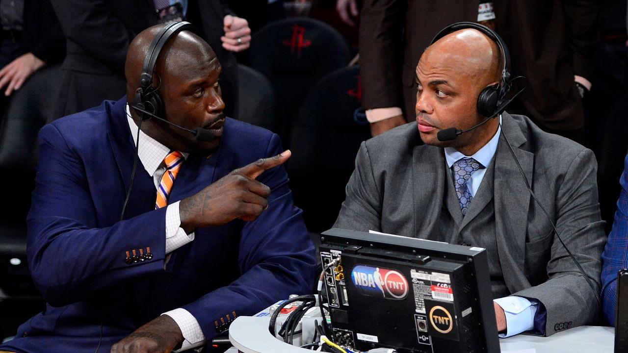 TNT broadcaster Shaquille O'Neal (left) and Charles Barkley talk during the 2013 NBA All-Star slam dunk contest at the Toyota Center.