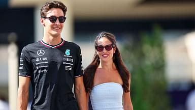 George Russell of Great Britain and Mercedes AMG Petronas F1 Team with Girlfriend Carmen Montero Mundt gesture arriving in the paddock, Qualifying, F1 Grand Prix of Abu Dhabi, Yas Marina Circuit on December 7, 2024 in Abu Dhabi, United Arab Emirates