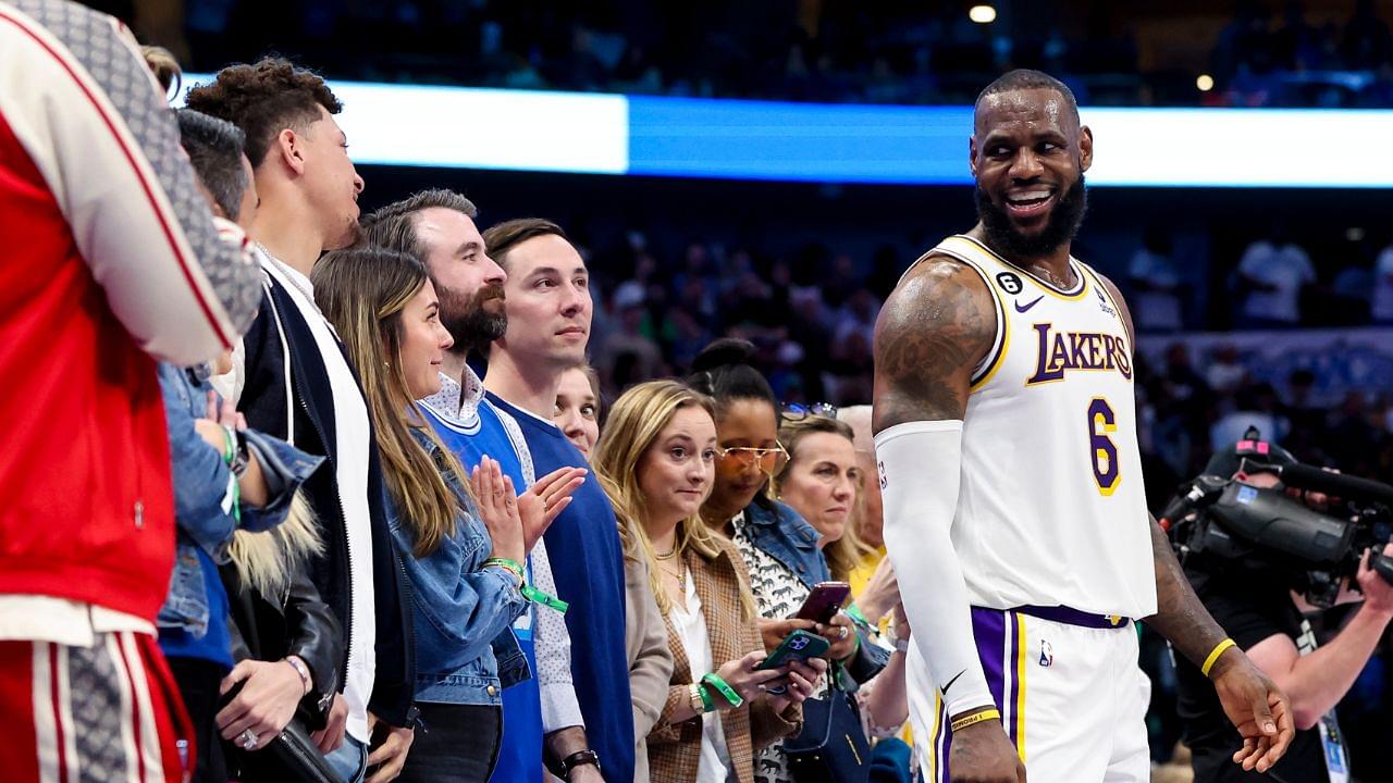 Los Angeles Lakers forward LeBron James (6) laughs with Kansas City Chiefs quarterback Patrick Mahomes during the fourth quarter against the Dallas Mavericks at American Airlines Center.