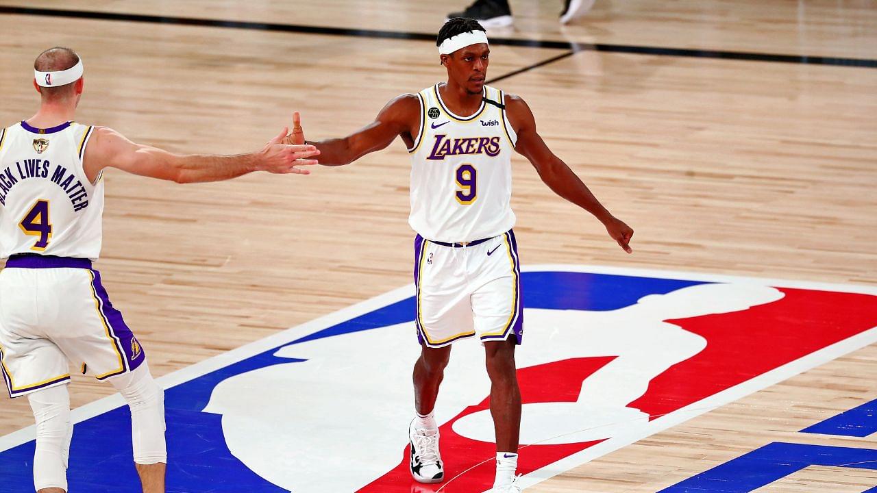 Los Angeles Lakers guard Rajon Rondo (9) is congratulated by guard Alex Caruso (4) after making a basket against the Miami Heat during the third quarter in game six of the 2020 NBA Finals at AdventHealth Arena.