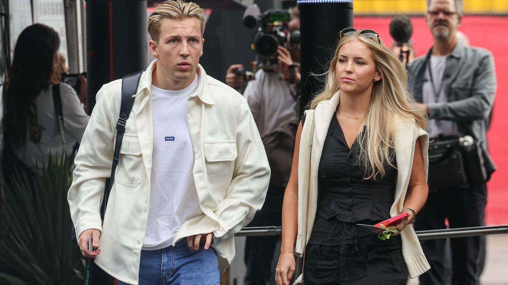 AUSTIN, TX - OCTOBER 18: Visa Cash App RB Formula One Team driver Liam Lawson (3) of New Zealand walks into the paddock with Hannah St. John before the first practice session of the Formula 1 Pirelli United States Grand Prix on October 18, 2024, at Circuit of The Americas in Austin, Texas.