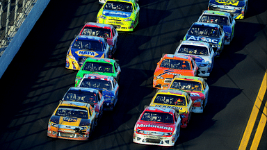 Feb 20, 2011; Daytona Beach, FL, USA; NASCAR Sprint Cup Series driver Trevor Bayne (21) restarts alongside David Ragan (6) during the Daytona 500 at Daytona International Speedway. Mandatory Credit: Mark J. Rebilas-Imagn Images