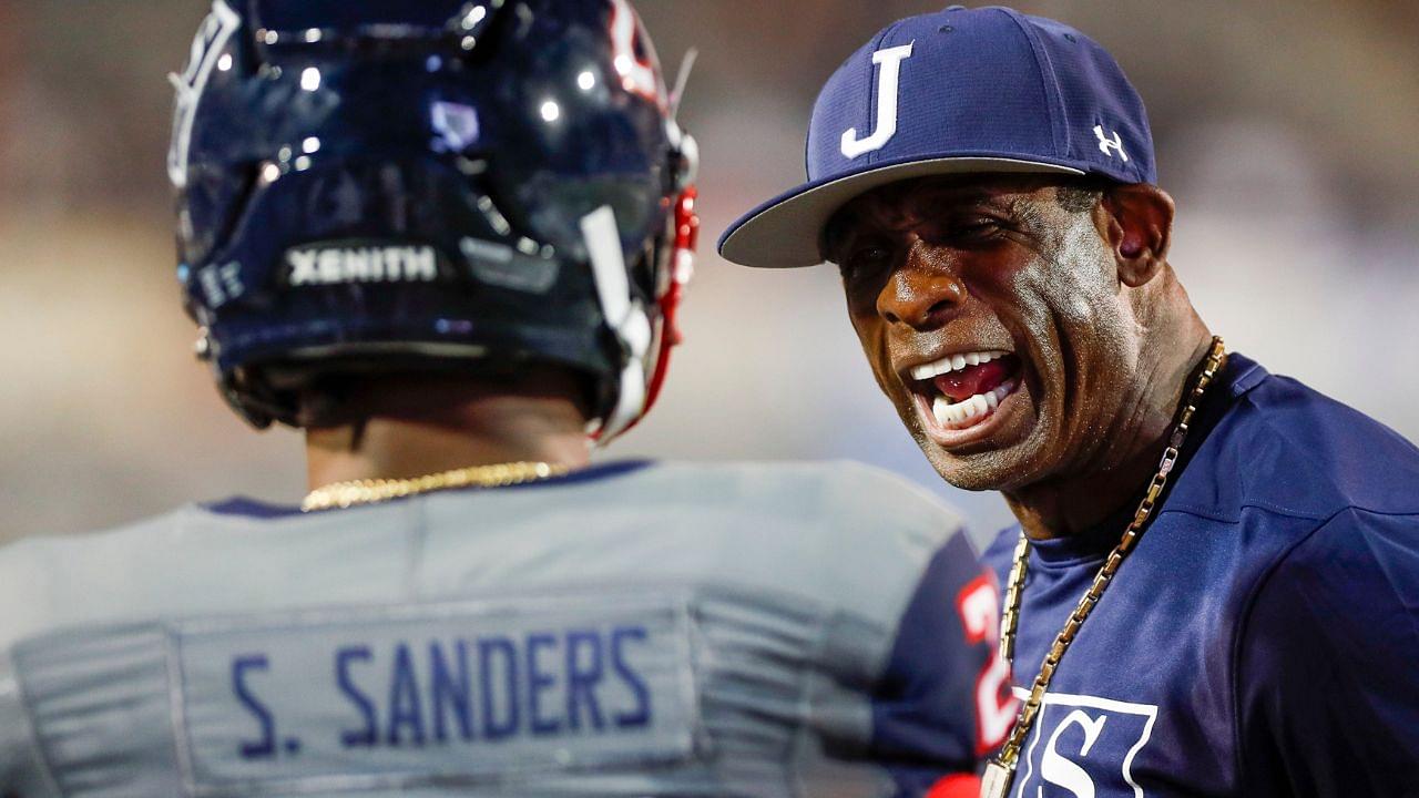 Jackson State head coach Deion Sanders yells at Jackson State safety Shilo Sanders (21) on the sideline in the Southern Heritage Classic between Tennessee State University and Jackson State University at Liberty Bowl Memorial Stadium in Memphis, Tenn., on Saturday