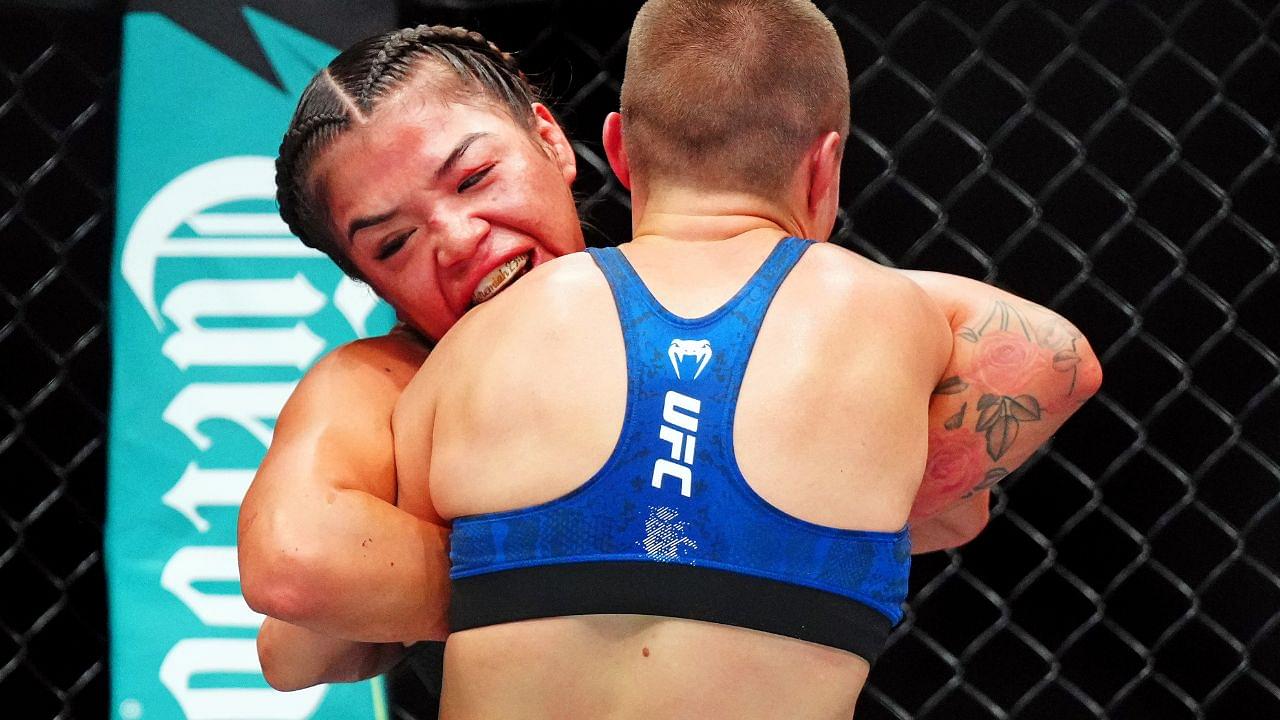 Rose Namajunas (red gloves) fights Tracy Cortez (blue gloves) during UFC Fight Night at Ball Arena