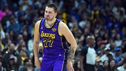 Los Angeles Lakers guard Luka Doncic (77) celebrates after a basket during the first half against the Denver Nuggets at Ball Arena.