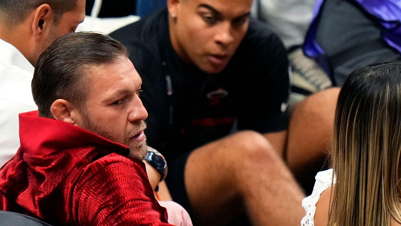 ; Irish mixed martial artist Conor McGregor looks on during the first half in game four of the 2023 NBA Finals between the Miami Heat and the Denver Nuggets at Kaseya Center.