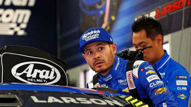 NASCAR Cup Series driver Kyle Larson (5) gets into his car during practice for the Daytona 500 at Daytona International Speedway.