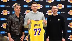 Los Angeles Lakers guard Luka Doncic poses for photos with general manager Rob Pelinka and head coach JJ Redick at UCLA Health Training Center.