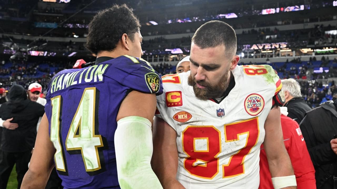 Kansas City Chiefs tight end Travis Kelce (87) greets Baltimore Ravens safety Kyle Hamilton (14) after their AFC Championship football game at M&T Bank Stadium.