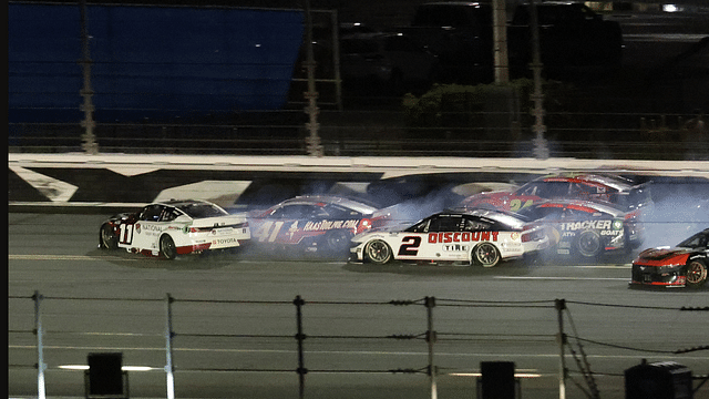 Feb 16, 2025; Daytona Beach, Florida, USA; NASCAR Cup Series driver Denny Hamlin (11), driver Cole Custer (41) and driver Corey LaJoie (01) wreck on the final lap during the Daytona 500 at Daytona International Speedway. Mandatory Credit: Mark J. Rebilas-Imagn Images