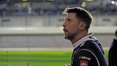 Denny Hamlin gets out of his car and checks out the screen during the Daytona 500 Pole Qualifying at Daytona International Speedway on Wednesday, Feb.12, 2025.