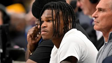 2024 Heisman Trophy winner Travis Hunter Jr. looks during the first half of the game between the Dallas Mavericks and the Minnesota Timberwolves at the American Airlines Center.