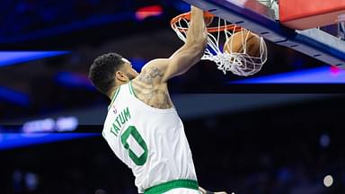 Boston Celtics forward Jayson Tatum (0) dunks the ball against the Philadelphia 76ers during the second quarter at Wells Fargo Center