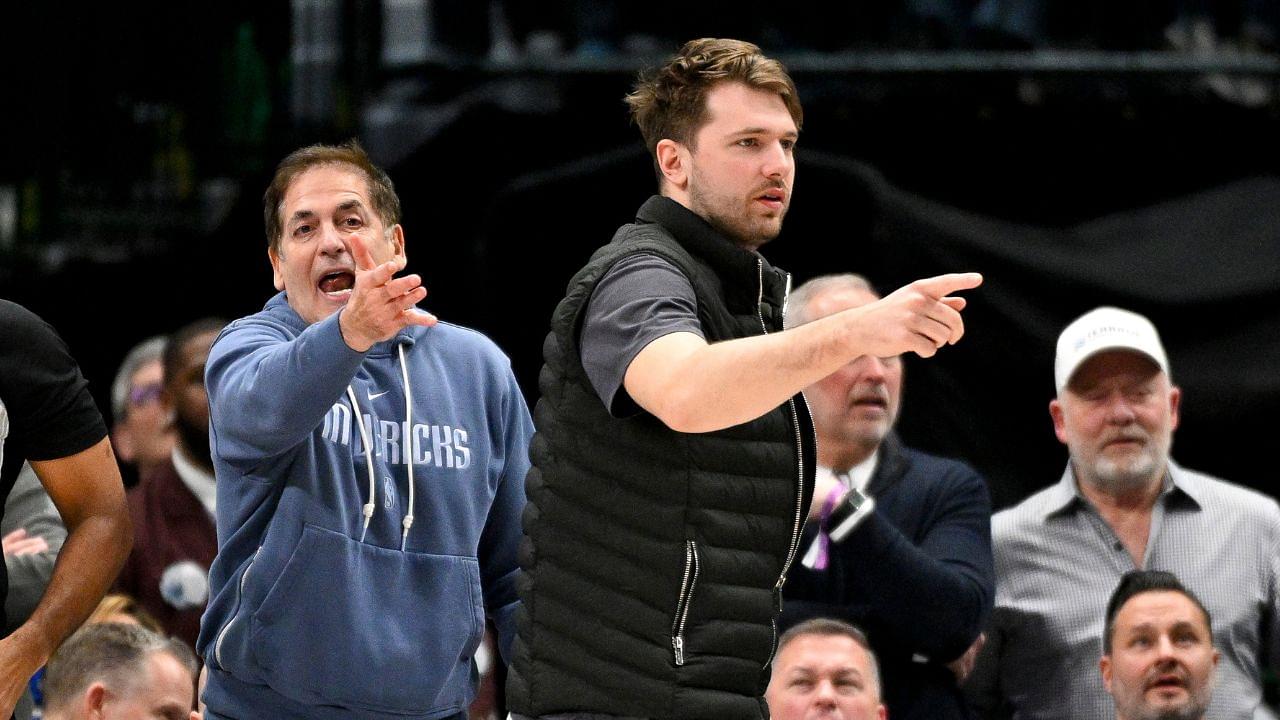 Dallas Mavericks guard Luka Doncic (right) and Mark Cuban (left) argue a call during the second half of the game against the New Orleans Pelicans at the American Airlines Center