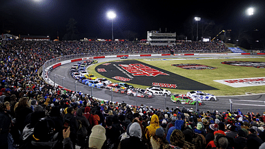 NASCAR Cup Series driver Chase Elliot (9) and NASCAR Cup Series driver Chris Buescher (17) lead a restart during the Clash at Bowman Gray at Bowman Gray Stadium.