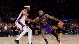 Los Angeles Lakers forward LeBron James (23) controls the ball against New York Knicks forward Precious Achiuwa (5) during the third quarter at Madison Square Garden.