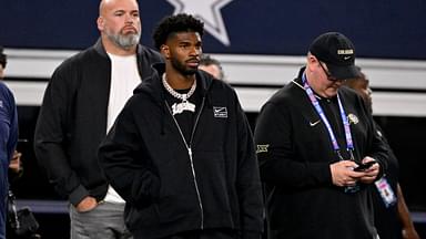 West quarterback Shedeur Sanders of Colorado (2) looks on from the sidelines during the first half against the East at AT&T Stadium.