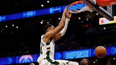 Milwaukee Bucks forward Giannis Antetokounmpo (34) dunks the ball as Washington Wizards guard Bilal Coulibaly (0) looks on in the first half at Capital One Arena