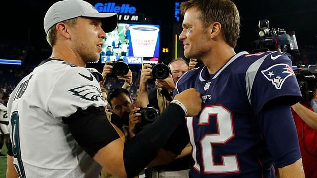 New England Patriots quarterback Tom Brady (12) meets Philadelphia Eagles quarterback Nick Foles (9) after the game at Gillette Stadium. Patriots defeated the Eagle 37-20.