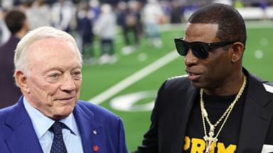 Colorado Buffaloes head coach Deion Sanders (right) talks with Dallas Cowboys owner Jerry Jones before the game against the Seattle Seahawks at AT&T Stadium.