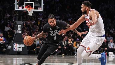 Brooklyn Nets guard D'Angelo Russell (1) drives past New York Knicks center Karl-Anthony Towns (32) in the third quarter at Barclays Center.